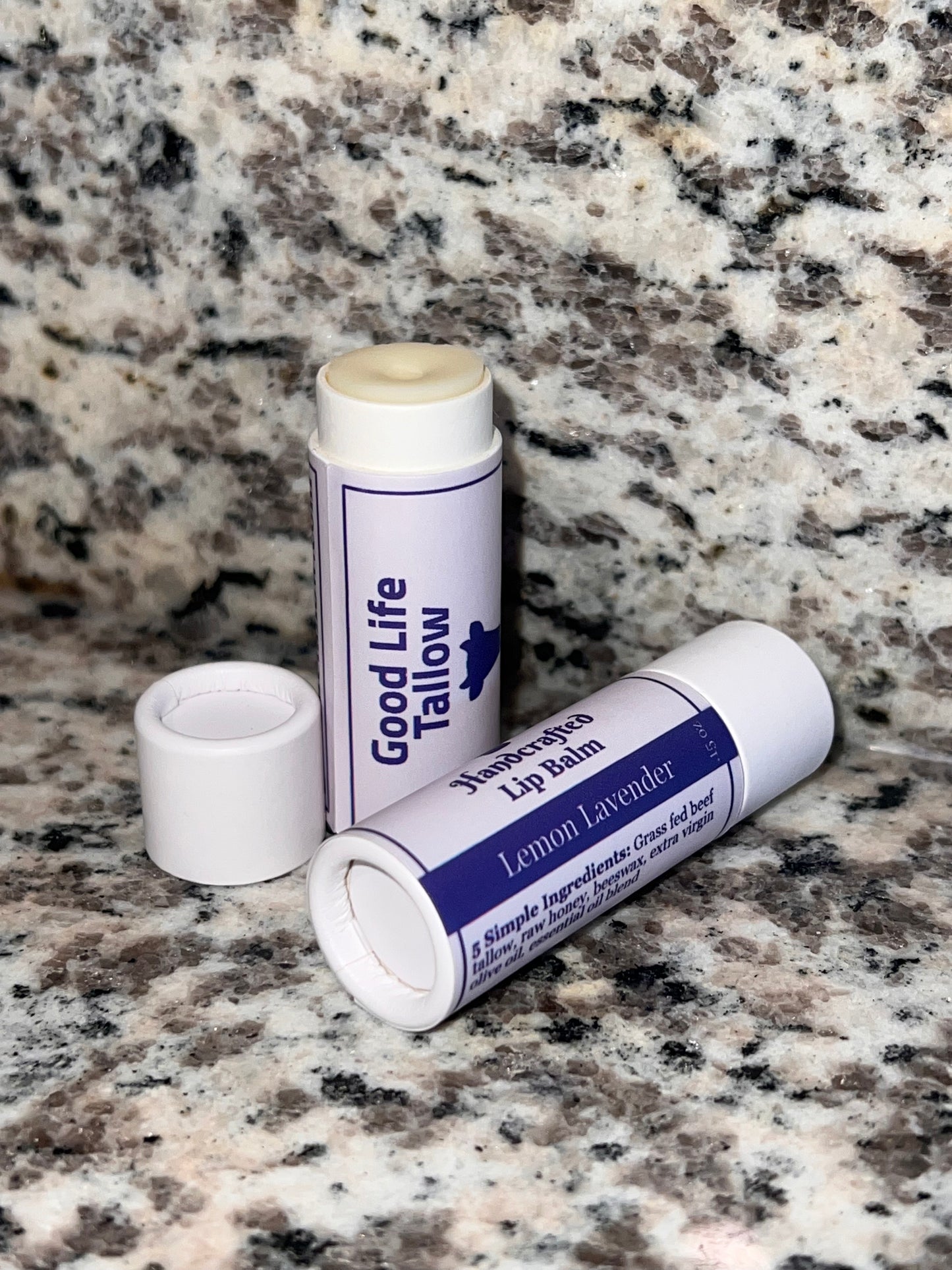 A group of tallow lip balm scented lemon lavender, which showcases the smooth texture and application of the tallow chapstick